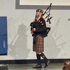 Bag Piper at the Remembrance Day Assembly