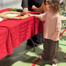 Miller Laying a poppy on the wreath